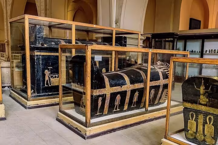 Ancient Egyptian sarcophagi inside the Egyptian Museum Cairo, featured on a private tour with Citadel and churches