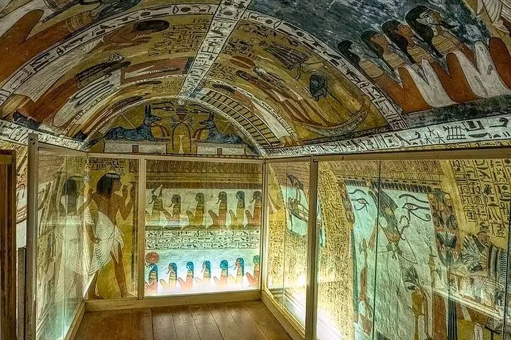 Intricately decorated Egyptian tomb chamber with vibrant hieroglyphics, featured in the West Bank Luxor tour.