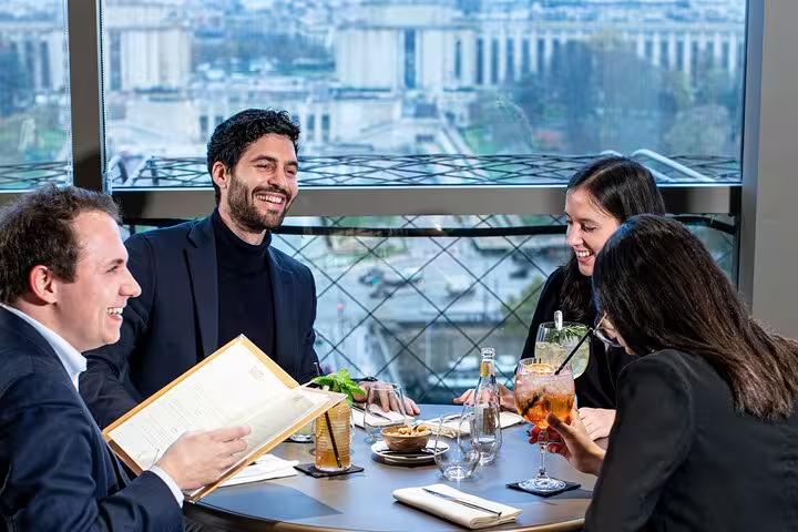 Luxury Eiffel Tower restaurant lunch with friends, included in private Paris tour with Seine cruise and Louvre