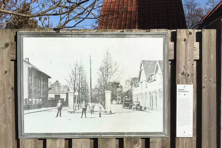 Historic street photo display in Eindhoven, connecting past and future on a guided city walking tour