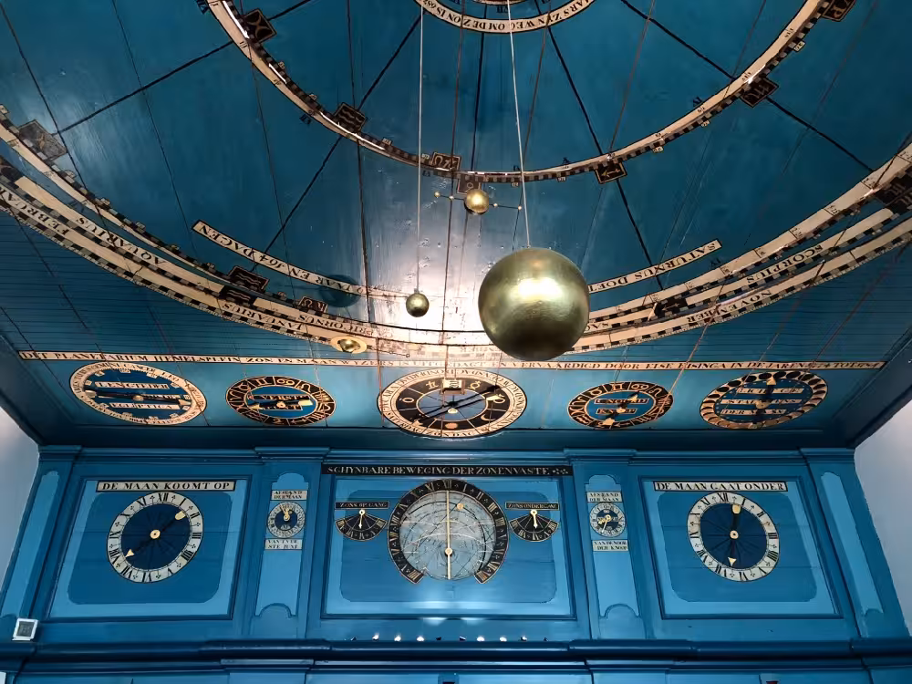 Eise Eisinga Planetarium-style astronomical ceiling and orrery display, cultural highlight on Dutch legacy tour