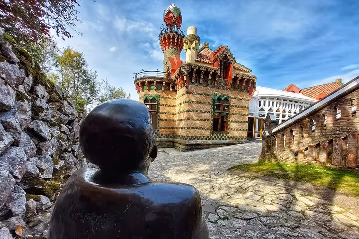 Stunning view of El Capricho, Gaudí's architectural gem, with intricate design in Cantabria's coastal tour.