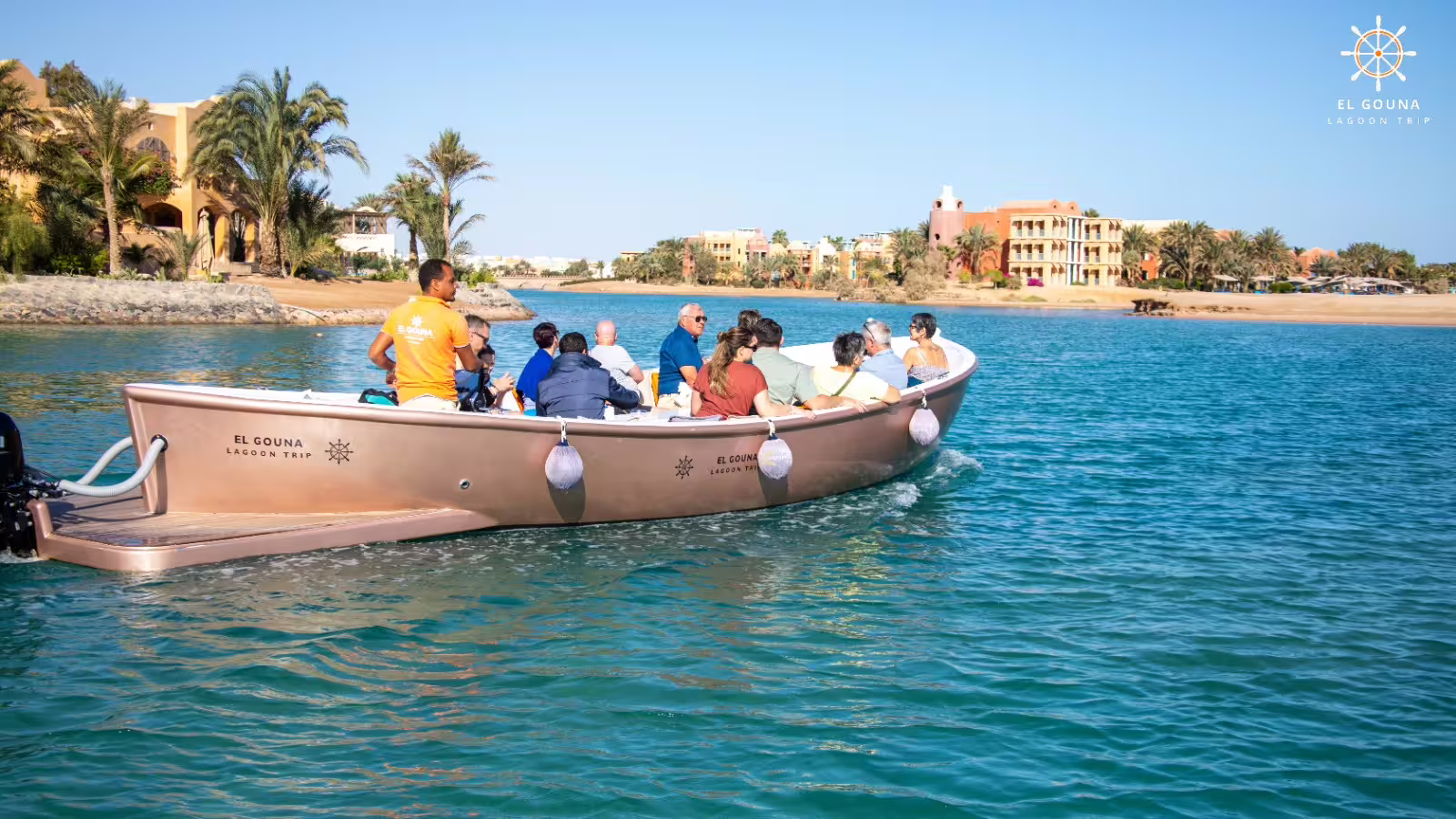 El Gouna Lagoon Trip speedboat with group sightseeing canals and beachfront hotels during a Red Sea city tour