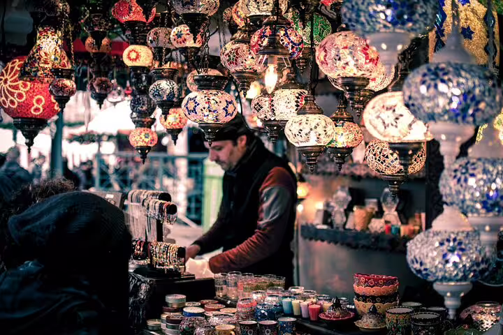 El Khan El Khalili Bazaar stall in Cairo with colorful mosaic lanterns and souvenirs on a private tour