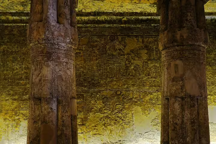 Ancient Egyptian carved stone columns and wall reliefs, El Minya private 2-day tour from Cairo to Tuna El Gabal