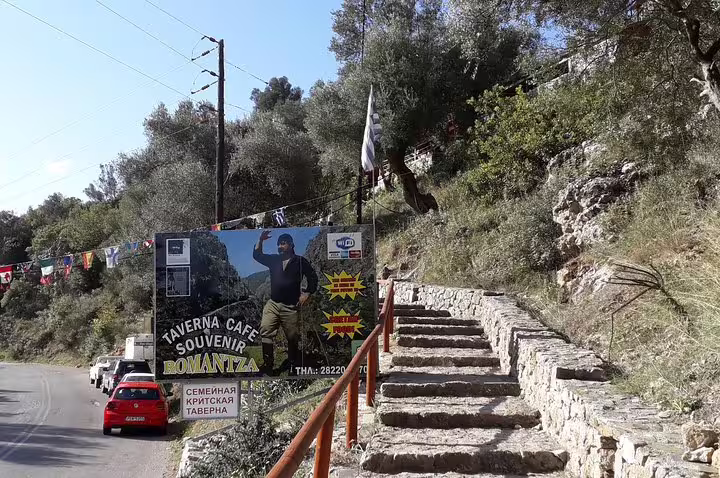 Stone steps leading to a taverna and souvenir shop near Chania, ideal for Elafonisi Beach tour with pink sands exploration.