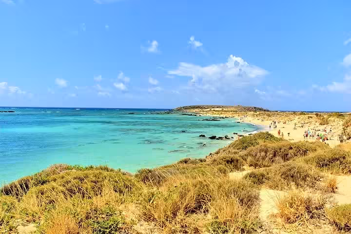 Elafonissi Beach lagoon with turquoise water and sandy dunes, scenic stop on a private day trip from Chania