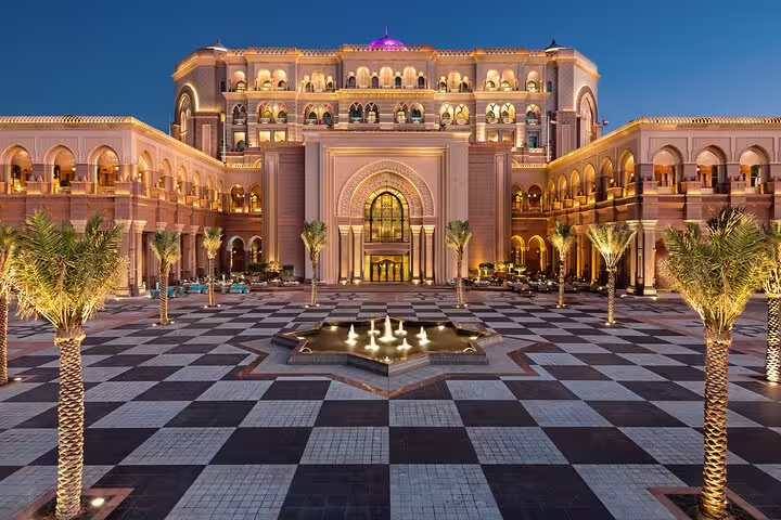 Illuminated courtyard of the luxurious Emirates Palace, a must-see stop on the Abu Dhabi full-day 4x4 tour.