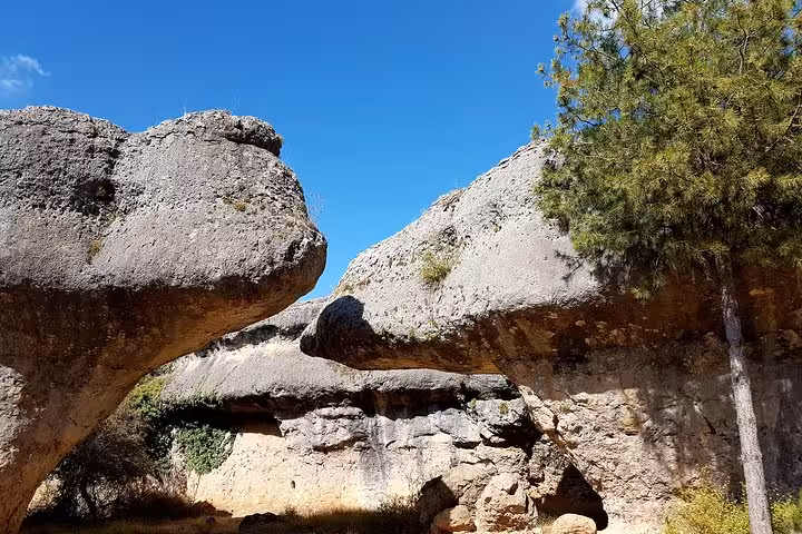 Massive mushroom-shaped limestone rocks in the Enchanted City near Cuenca, Ventano del Diablo excursion