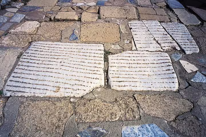 Close-up of ancient marble street paving in Ephesus, Turkey on a private day tour with guide