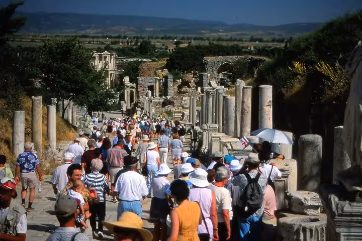 Crowds touring Curetes Street in Ancient Ephesus on a private shore excursion from Kusadasi Port