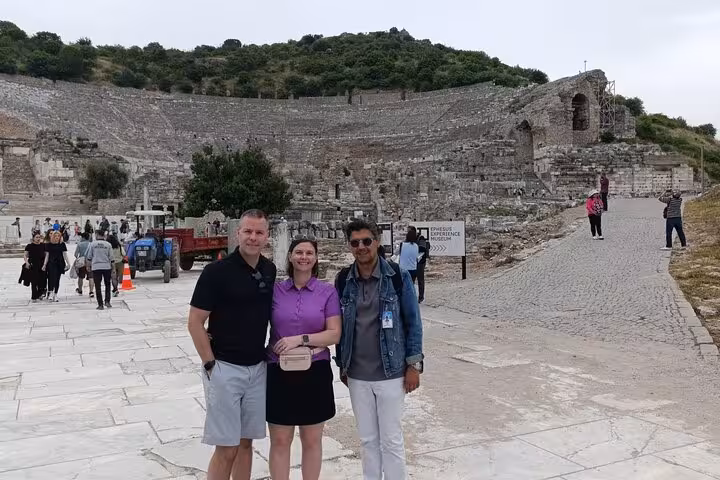 Guests with local guide at Ephesus Great Theatre on private shore excursion from Kusadasi cruise port