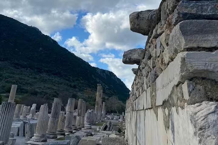 Marble columns and ancient wall along Ephesus ruins on private Ephesus tour including St John Basilica and lunch