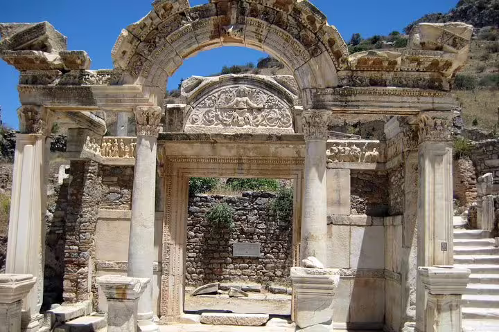 Ornate Roman archway and marble columns in ancient Ephesus on a guided day tour from Izmir, Turkey