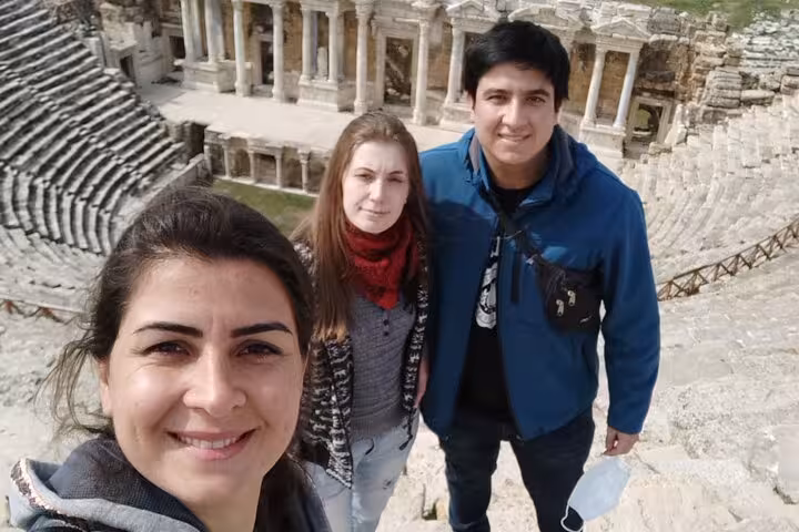 Travelers selfie inside Ephesus Great Theatre ruins, part of the 2 day Ephesus Aphrodisias Pamukkale tour