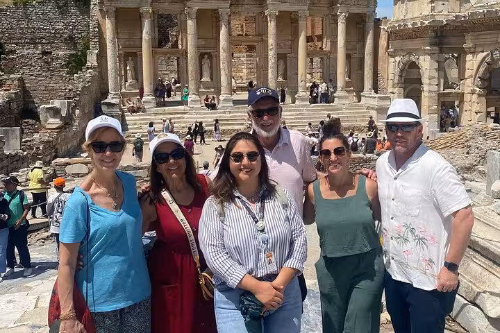 Group photo at the Library of Celsus on Ephesus day tour from Istanbul by plane with local guide