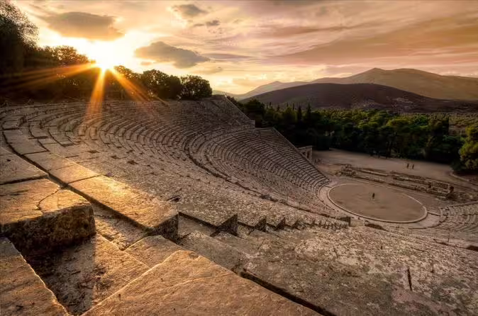 Sunset over Ancient Theatre of Epidaurus on a private day tour from Athens to Nafplio, Mycenae and canal