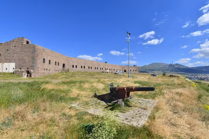 Erzurum Castle ramparts with historic cannon and mountain views, featured on a private all-inclusive 2-day tour