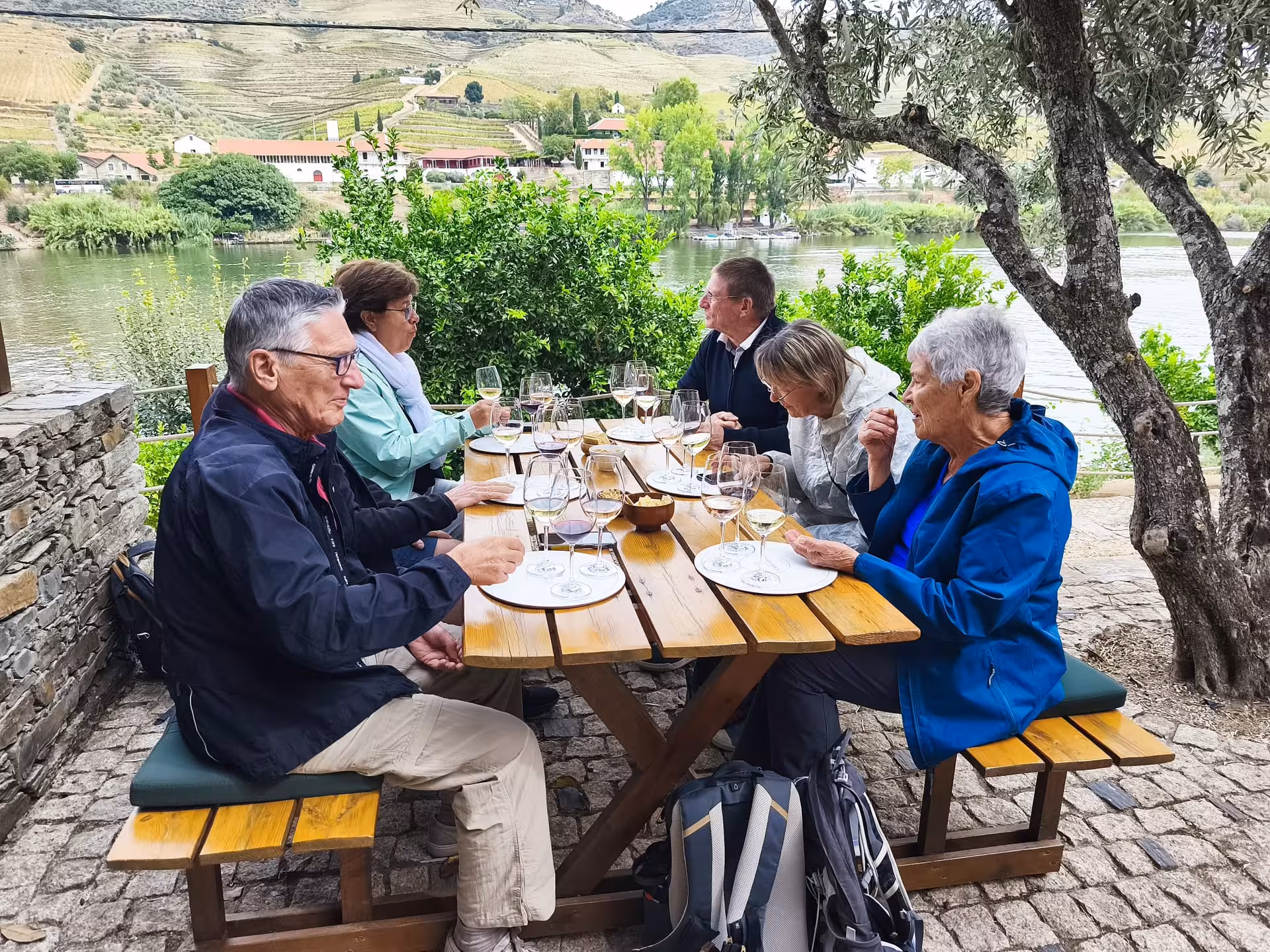 Essence Tour riverside wine tasting lunch with terrace vineyard views in Portugal’s Douro Valley