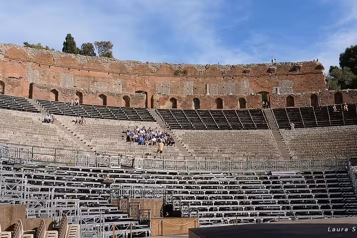Visit the ancient Greek Theatre of Taormina with stunning views on the Etna and Taormina Tour.