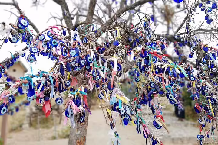 Evil eye wish tree in Cappadocia, Turkey, on full-day flight tour from Istanbul with guided sightseeing stops