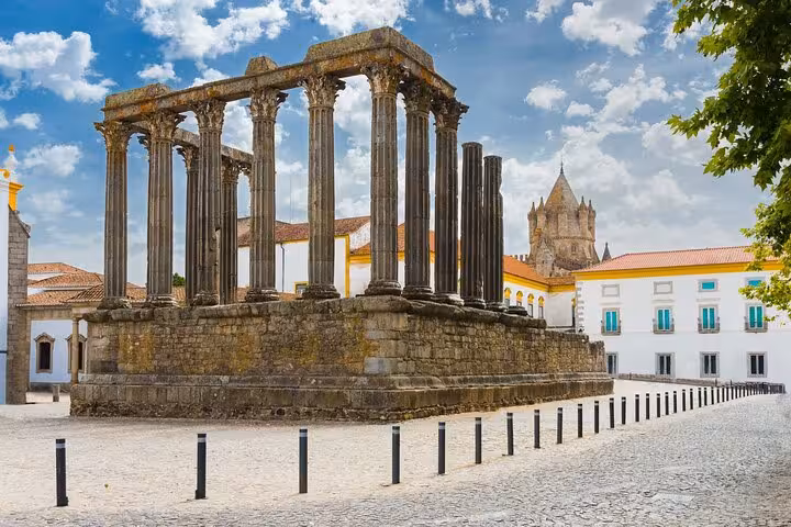 Explore the Roman Temple of Évora on a private walking tour with a local guide, revealing Portugal's ancient history.