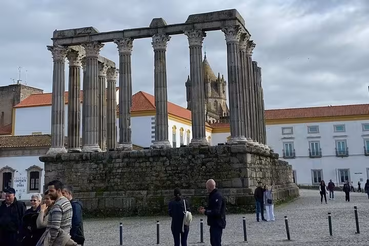 Explore ancient Roman temple ruins in Évora on the Évora Uncovered Private Tour of Cork Culture and Alentejo Wines.