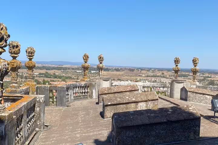 Scenic rooftop view of Évora's landscape from a historic site, offering panoramic vistas on a full day tour from Lisbon.