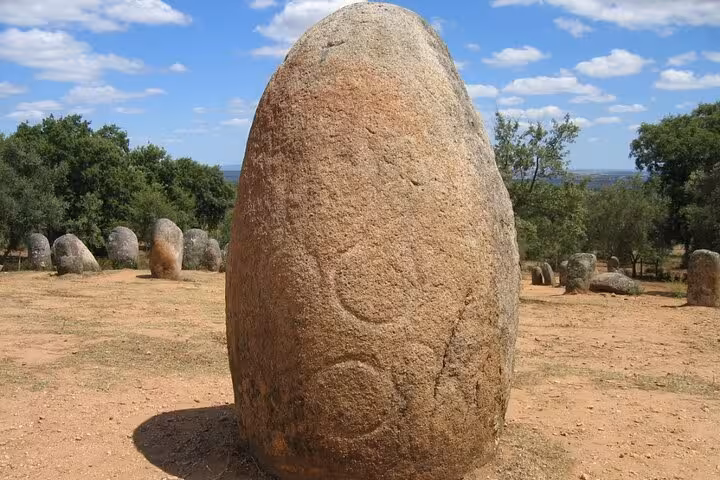 Marvel at Évora's standing stones on a guided private tour, showcasing ancient prehistoric monuments and landscapes.