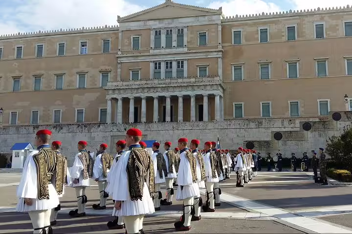 Evzones guards in traditional uniform lined up at Syntagma Square, Athens Highlights private half-day tour