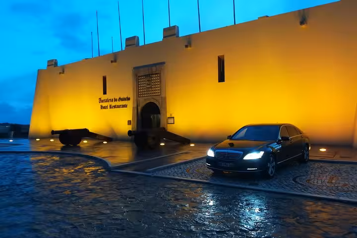 Executive sedan airport shuttle transfer to Lisbon city center, private door-to-door pickup and drop-off