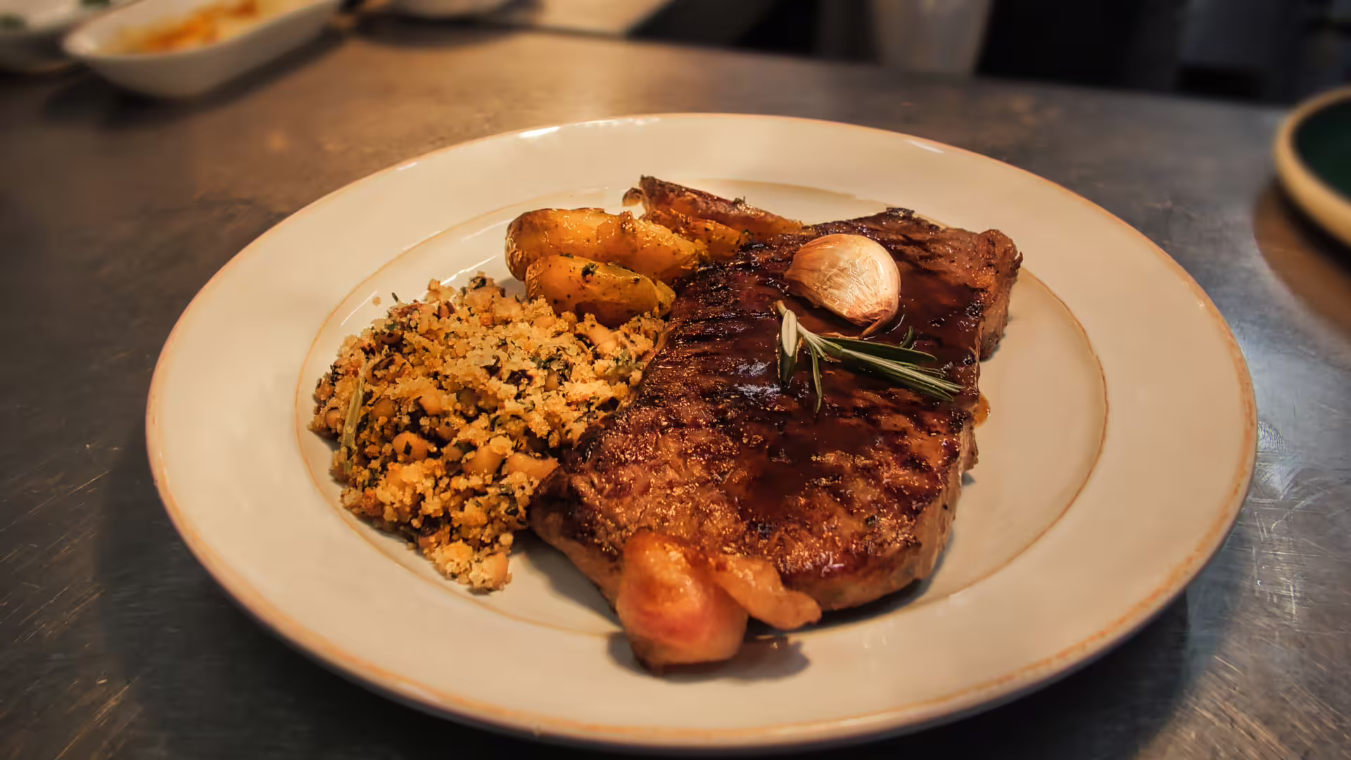 Steak with potatoes baked and vegetables at our local restaurant in Porto, part of Cooltour Oporto's Fado Dinner Show and Night Tour
