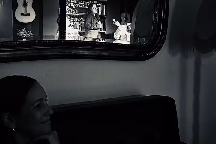 Reflection of Fado performers in a mirror, capturing the soulful essence of traditional Lisbon music.