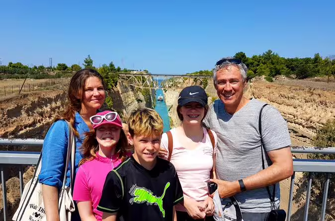 Family at Corinth Canal viewpoint on private Athens day tour to Ancient Corinth and Mycenae sites