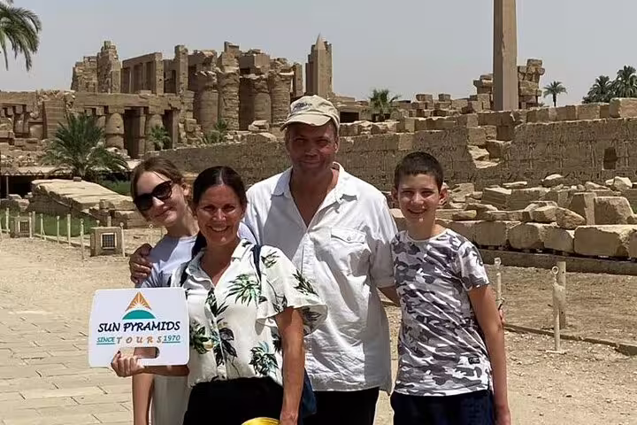 Family at Karnak Temple ruins on private Luxor day tour from Cairo by air, Egypt guided sightseeing