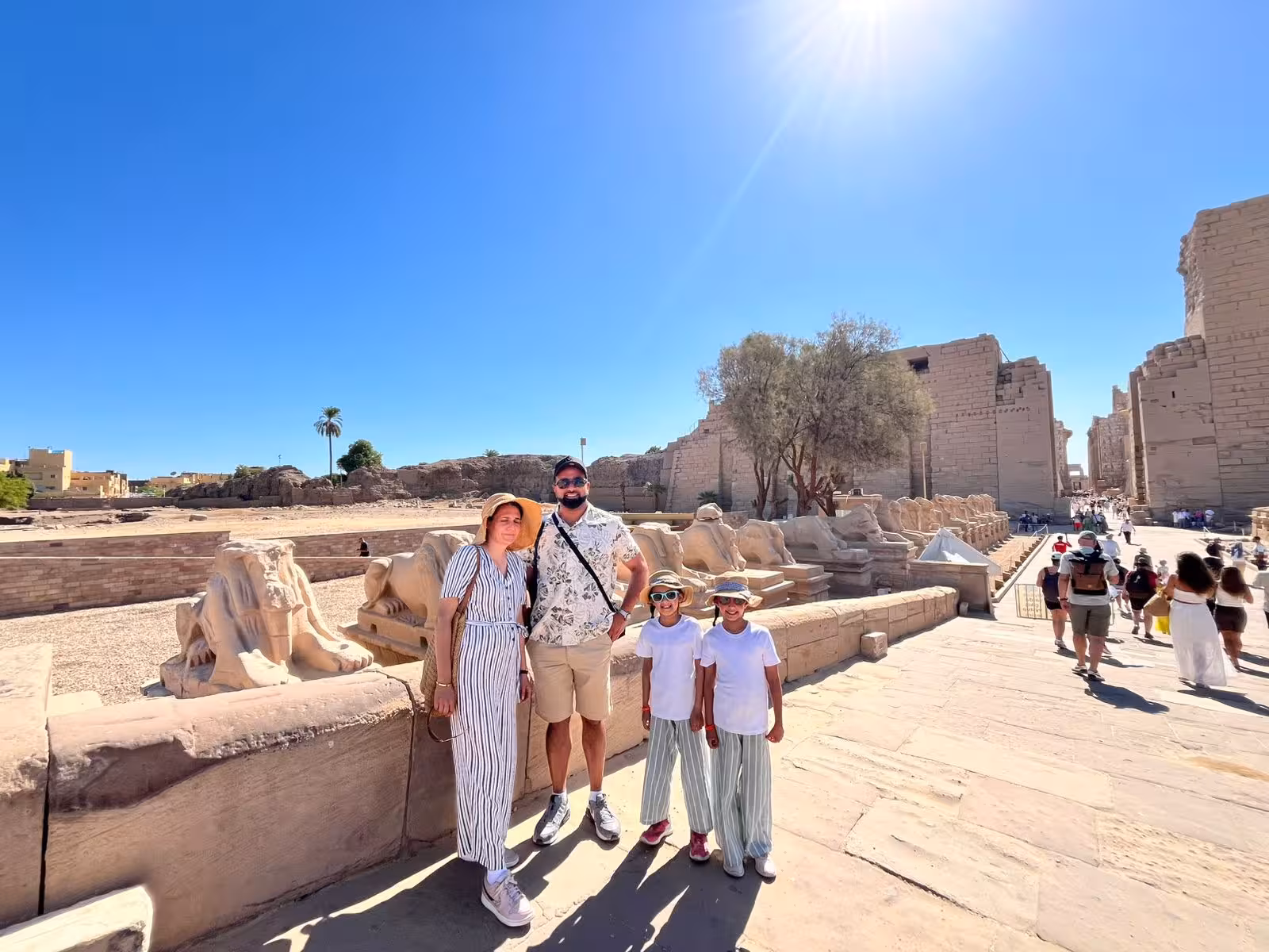 Family at Karnak Temple sphinx avenue in Luxor on Hurghada Valley of the Kings and Tutankhamun tomb trip