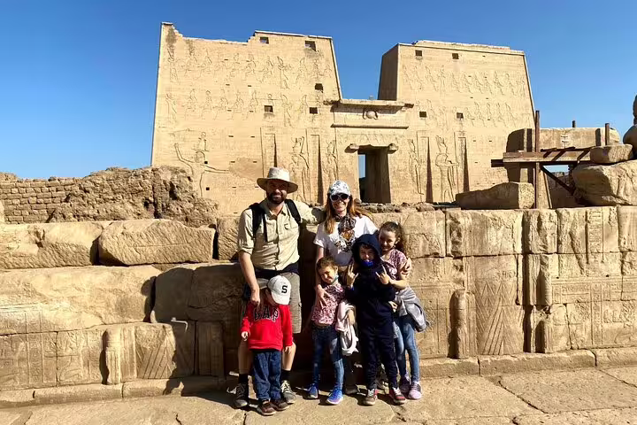 Family at Philae Temple in Aswan, Egypt, on a 14-day Nile cruise and Sahara desert bus adventure tour
