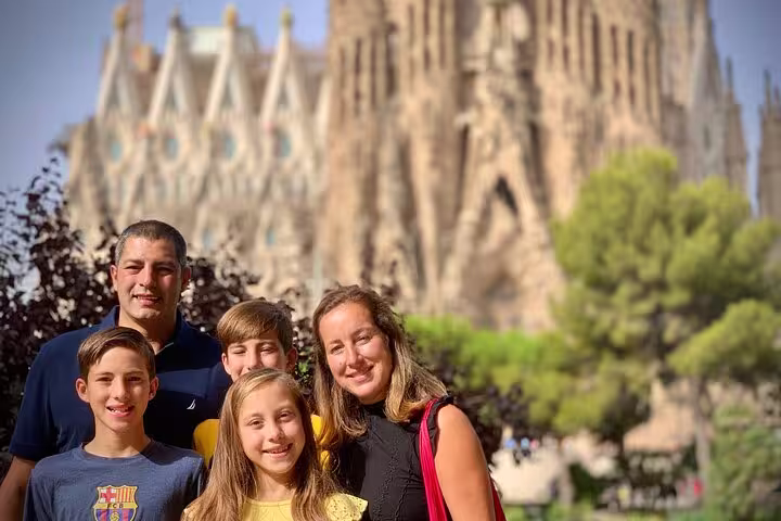 Family enjoying a private photography class with iconic architecture in the background at the park and old town tour.