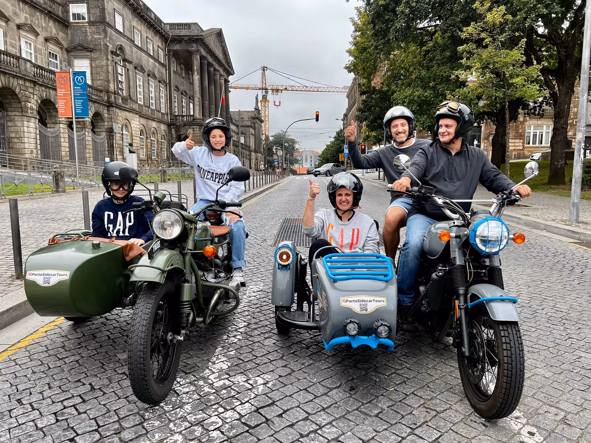 Family on classic sidecar motorcycles in Porto city center, ALL DAY TOUR PORTO private sightseeing adventure