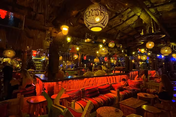 Farsha Cafe Sharm El Sheikh interior with lanterns and Bedouin seating on guided city sightseeing tour