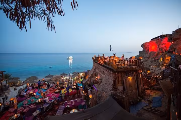 Sunset view over Farsha Cafe terrace in Sharm El Sheikh with Red Sea backdrop on guided city tour