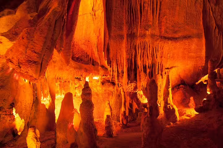 Vibrant limestone formations in a cave near Fátima, Portugal, showcasing natural beauty on the religious tour to Fátima and Aljustrel.