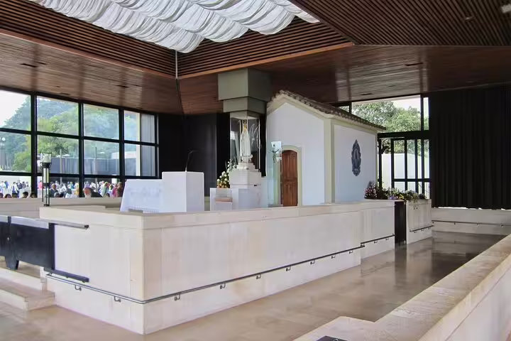 Interior view of the Fátima Sanctuary chapel, highlighting its serene architecture and religious significance.