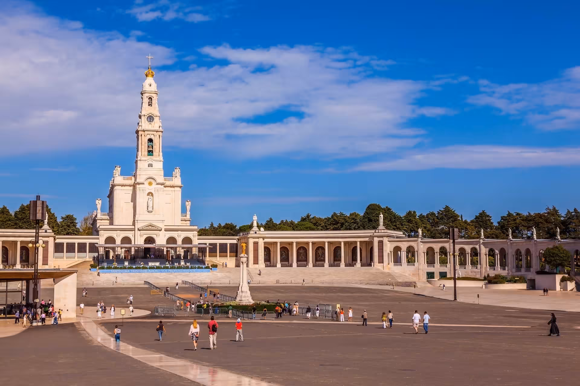Panoramic view of the Sanctuary of Fátima, an iconic pilgrimage site, featured in the Fátima, Óbidos, Batalha & Nazaré Tour.