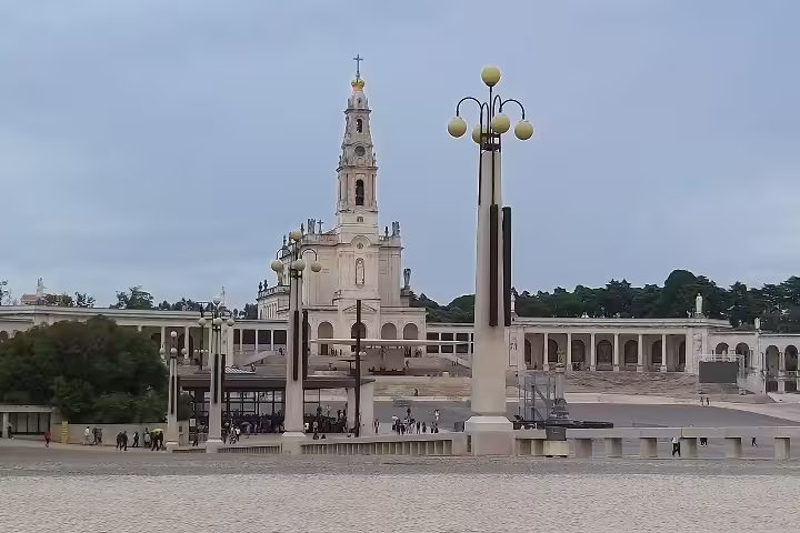 Scenic view of Fátima Sanctuary's grand architecture, ideal for a private tour highlighting its spiritual significance and history.