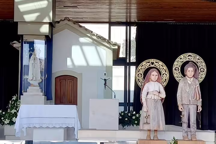 View of religious statues at the Sanctuary of Fatima, a highlight on the Private Fatima Sintra Tour from Lisbon.