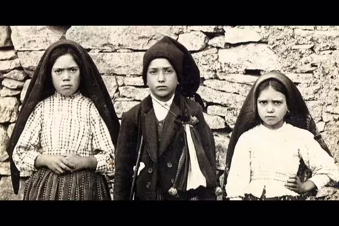 Historic photo of the three shepherd children of Fatima, a significant cultural site near Lisbon, Portugal.