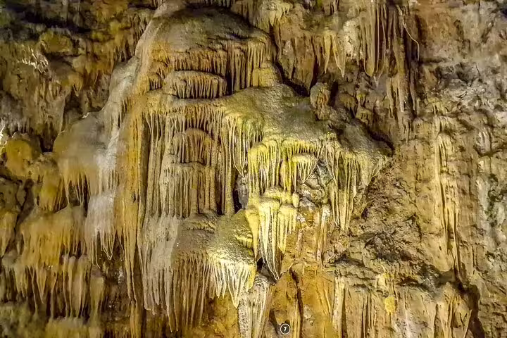 Stunning stalactites in Portugal's largest caves, featured on a Fatima full-day private tour from Lisbon.