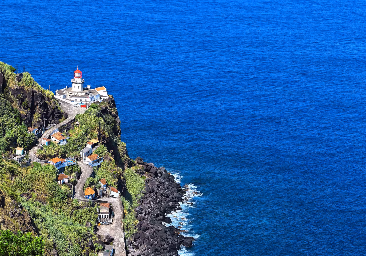 Nordeste cliffside lighthouse and coastal road above Atlantic on Sao Miguel, Azores, FD JEEP Povoacao e Nordeste tour