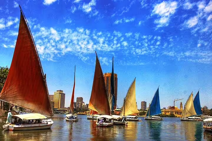 Traditional felucca sailboats on the Nile in Cairo, Egypt, part of private Coptic Cairo tour and felucca ride